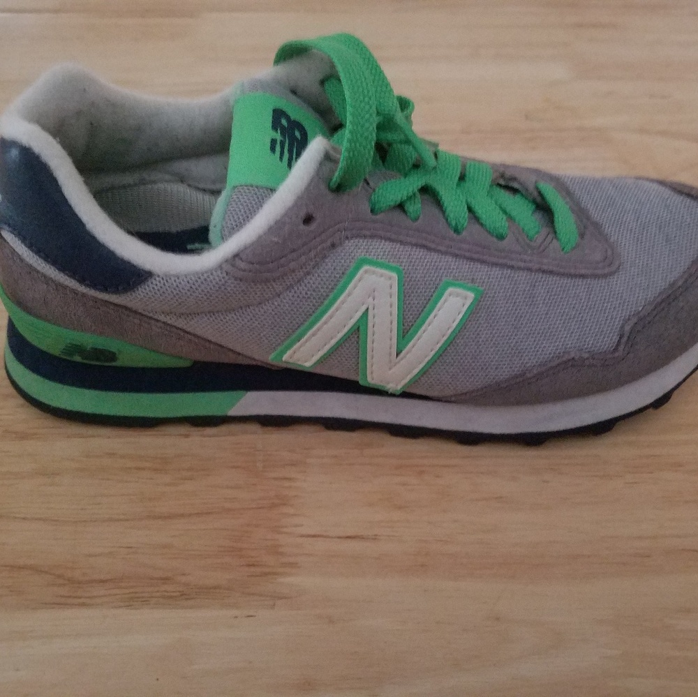 Grey and green new balance sneakers